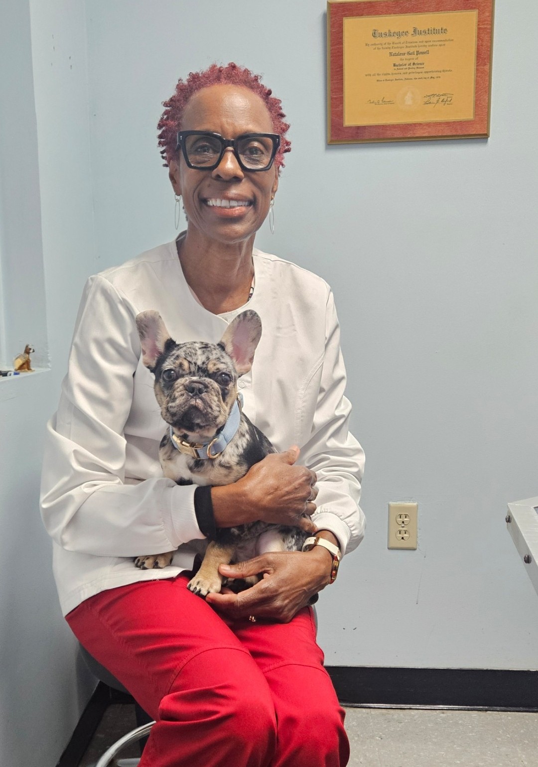 Dr. Powell-Johnson with a patient